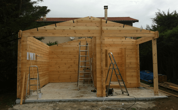 Construction garage en bois sur béton